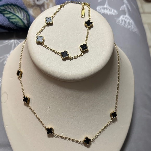 None Jewelry - Gold-Tone Necklace with Black Clover Motifs